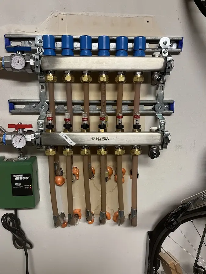 Plumber performing Leak Detection at a residential property in Framingham